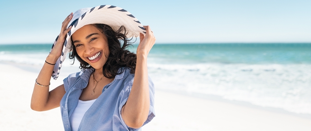 Portrait,Of,Stylish,Latin,Hispanic,Woman,With,White,Straw,Hat